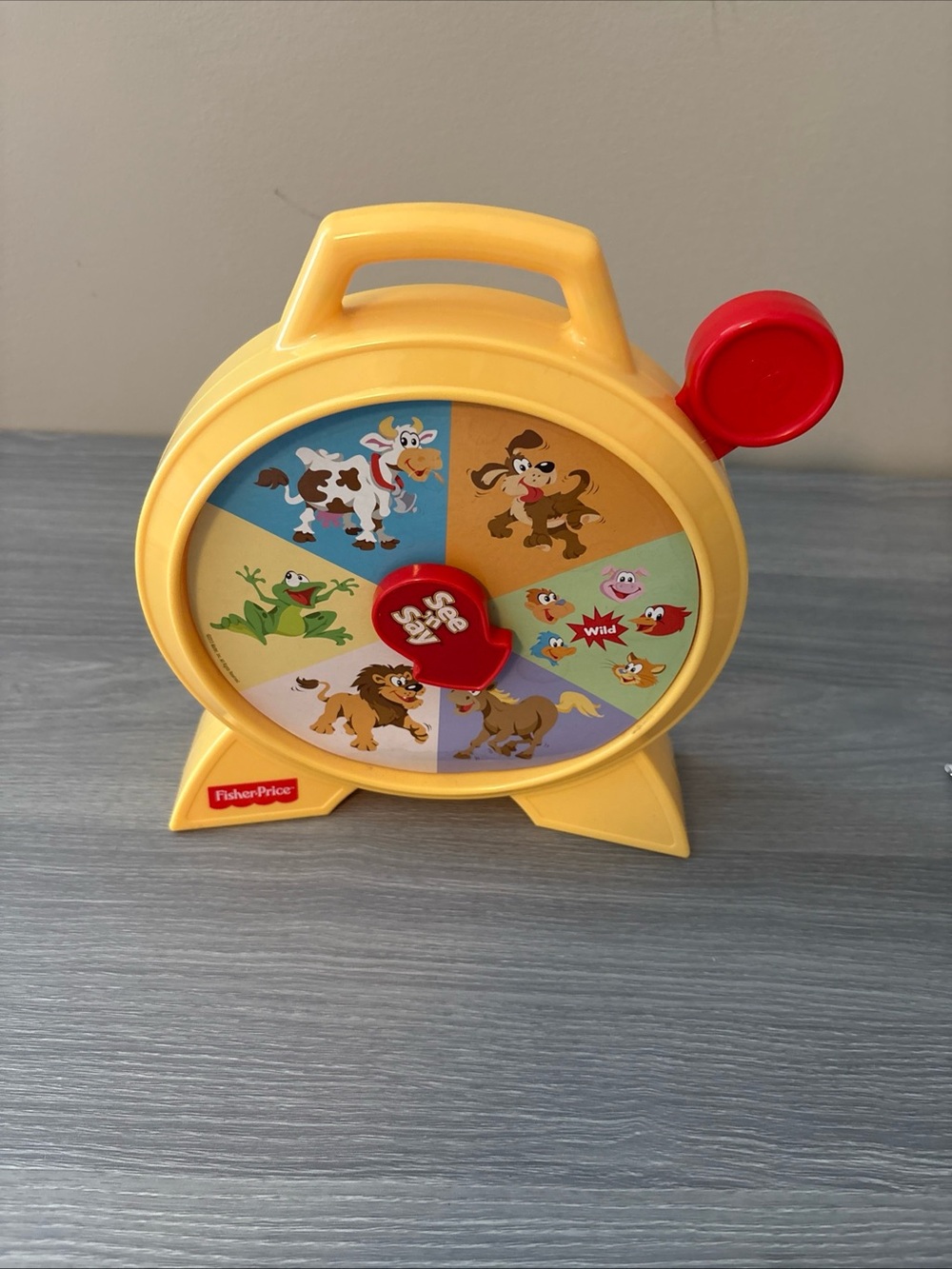 Fisher-Price Yellow and Red Animal Spinner Learning Toy